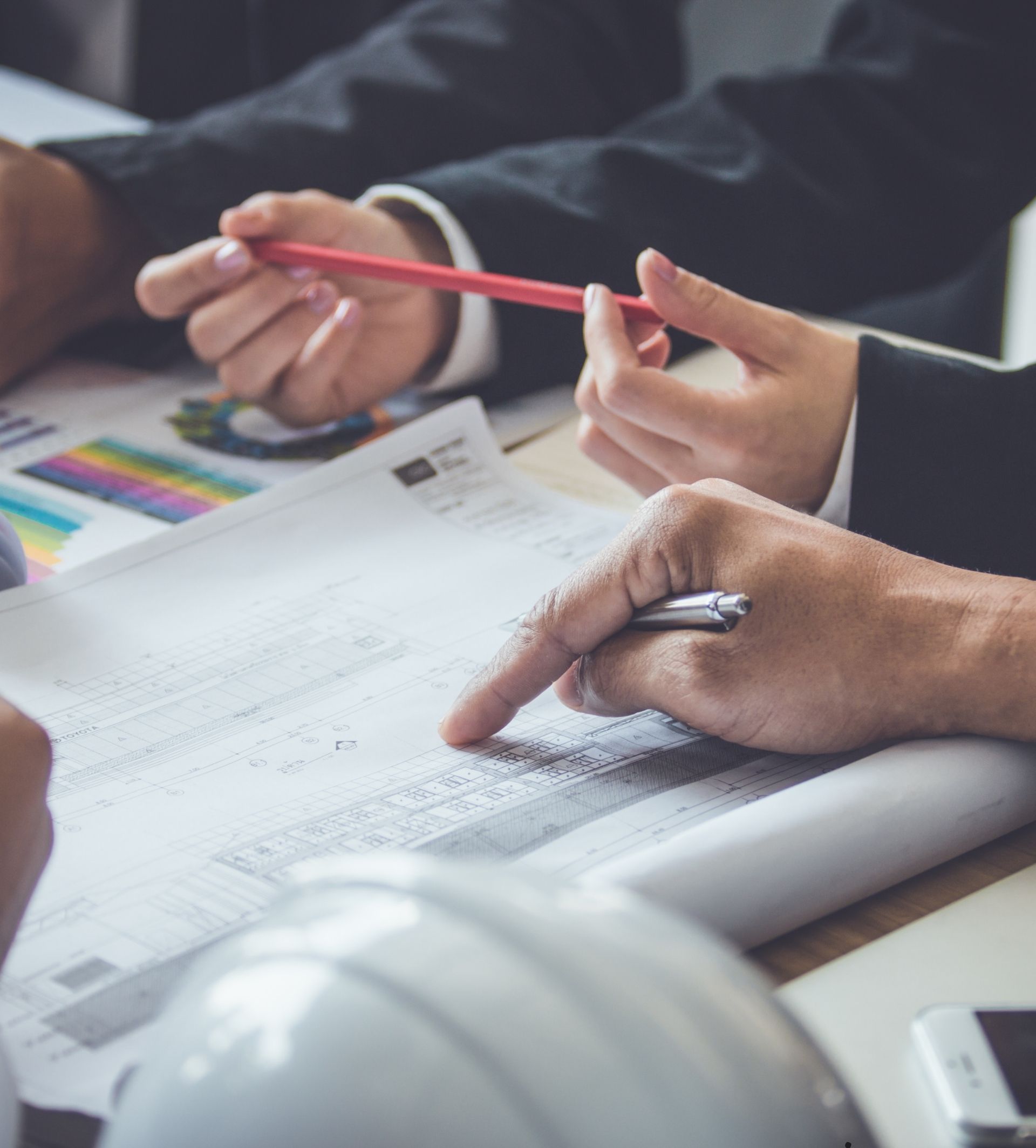 IMIS engineers reviewing project plans